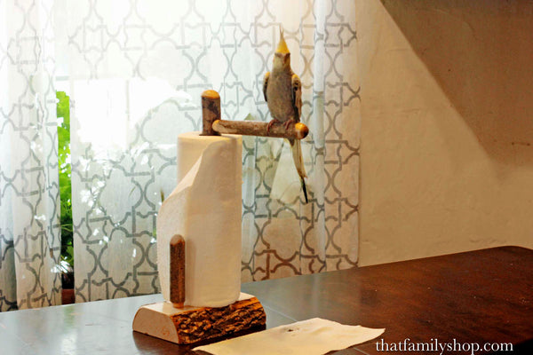 The "Poopy Perch" Paper Towel Holder and Pet Bird Trainer